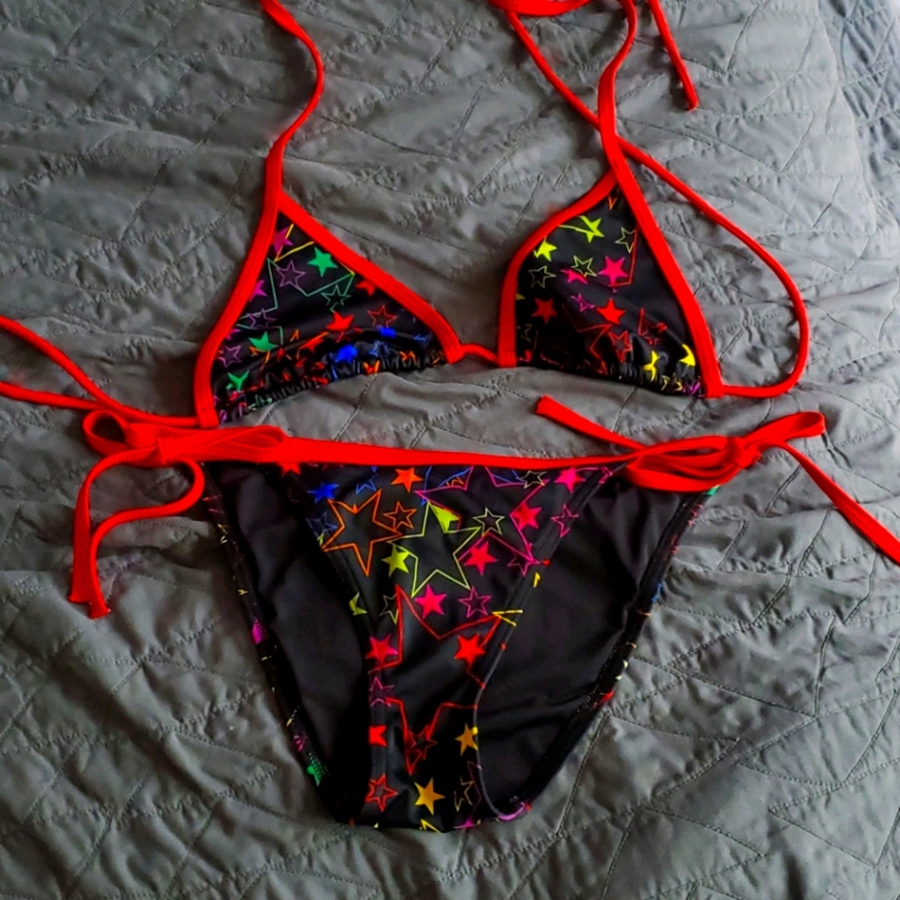 Black bikini with colorful star print.
